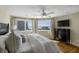 Tranquil main bedroom with ocean views, ceiling fan, wood floors, and sophisticated decor at 1109 Diodia Ct, Kiawah Island, SC 29455