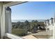 Scenic ocean view from a window showcasing the coastline, beach, and lush greenery at 1109 Diodia Ct, Kiawah Island, SC 29455