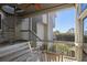 Outdoor porch with spiral staircase and seating at 1109 Diodia Ct, Kiawah Island, SC 29455