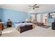 Serene bedroom featuring a vaulted ceiling, plush carpeting, and ample natural light at 1117 Walleye Rd, Bonneau, SC 29431