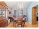 Inviting dining room with a chandelier, hardwood floors, and colorful decor at 1117 Walleye Rd, Bonneau, SC 29431