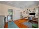 Spacious home office leading into the kitchen area with hardwood floors and natural light at 1134 North Blvd, North Charleston, SC 29405