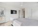 This bedroom offers a door to an outdoor porch plus a large TV at 120 Diploma Dr, Ladson, SC 29456