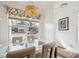 Inviting dining area features a modern chandelier and a large window at 120 Diploma Dr, Ladson, SC 29456