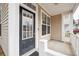 Welcoming front entrance with a black glass-paneled door and white trim at 120 Diploma Dr, Ladson, SC 29456