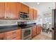 Spacious kitchen featuring stainless steel appliances and a view of the dining area at 120 Diploma Dr, Ladson, SC 29456