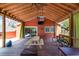 Charming back porch with fans, lighting, and comfortable seating, perfect for enjoying the outdoors at 1235 Sunset Dr, Charleston, SC 29407