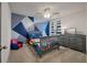Fun, kid-friendly bedroom with colorful decor, including patterned walls and character-themed bedding at 133 Caleb Ct, Ladson, SC 29456
