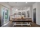 Bright dining area with sliding glass door and open concept kitchen with stainless steel appliances at 133 Caleb Ct, Ladson, SC 29456