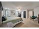 Expansive main bedroom with natural light, carpet floors, and ensuite bathroom access at 133 Caleb Ct, Ladson, SC 29456