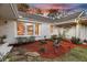 Charming brick home featuring landscaped yard and stone pathway at 1522 N Pinebark Ln, Charleston, SC 29407