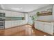 Bright kitchen with white cabinets, wood countertops, and stainless steel appliances at 1522 N Pinebark Ln, Charleston, SC 29407