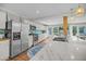 Bright kitchen features stainless steel appliances, a blue tile backsplash, a butcher block countertop, and pendant lighting at 1522 N Pinebark Ln, Charleston, SC 29407