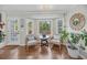 Cozy seating area with a bay window, comfortable chairs, and stylish decor at 1522 N Pinebark Ln, Charleston, SC 29407