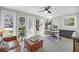 Bright office featuring large windows, leather furniture, and a modern desk with computer setup at 1522 N Pinebark Ln, Charleston, SC 29407