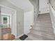 View of the carpeted stairway that leads to the upper level of the home at 1522 N Pinebark Ln, Charleston, SC 29407