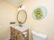 Charming bathroom vanity featuring a marble countertop, undermount sink, and decorative accents at 202 Hunt Club Dr, Summerville, SC 29485
