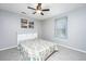 Comfortable bedroom featuring a ceiling fan and window, ensuring a comfortable atmosphere at 202 Hunt Club Dr, Summerville, SC 29485