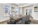 Stylish dining room featuring an elegant table with gray chairs and decorative chandelier at 204 Belfort Pl, Summerville, SC 29486