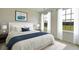 Cozy bedroom features a large bed, matching nightstands, and plenty of natural light at 204 Belfort Pl, Summerville, SC 29486