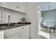 Charming bathroom featuring a wet bar and a clawfoot tub at 212 Chinaberry Ln, Kiawah Island, SC 29455
