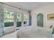 Bright bedroom with access to a balcony and unique architectural details at 212 Chinaberry Ln, Kiawah Island, SC 29455