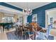 Elegant dining room with chandelier, ample seating, and stylish decor at 212 Chinaberry Ln, Kiawah Island, SC 29455