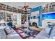 Living room with fireplace, built-in bookshelves, and comfortable seating at 212 Chinaberry Ln, Kiawah Island, SC 29455