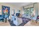 Bright living room featuring grand piano, hardwood floors, and stylish decor at 212 Chinaberry Ln, Kiawah Island, SC 29455