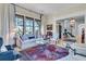Cozy living room with ample natural light and classic furnishings at 212 Chinaberry Ln, Kiawah Island, SC 29455