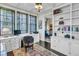 Bright office space featuring custom bookshelves and ample workspace at 212 Chinaberry Ln, Kiawah Island, SC 29455