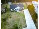 An aerial view of a home with a long drive and lush green grass at 218 Mohican Cir, Summerville, SC 29483