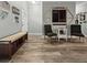 Inviting entryway with bench seating, coat rack, decor and wood-look floors at 218 Mohican Cir, Summerville, SC 29483