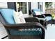 A close up of the cozy furniture and decor on the covered front porch of this lovely home at 218 Mohican Cir, Summerville, SC 29483
