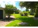 View of lush greenery and a brick path, providing a tranquil atmosphere at 219 Rigby St, Reevesville, SC 29471