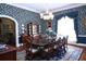 Refined dining space featuring a large window with decorative valance and hardwood flooring at 219 Rigby St, Reevesville, SC 29471