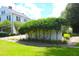 Exterior view of the home with manicured bushes and a brick walkway at 219 Rigby St, Reevesville, SC 29471