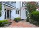 Exterior view of home with a welcoming patio and well-maintained landscaping at 219 Rigby St, Reevesville, SC 29471