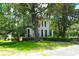 Elegant home with well-manicured lawn and beautiful mature trees at 219 Rigby St, Reevesville, SC 29471