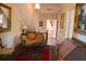 Upstairs hallway featuring a sofa, ornate furnishings, and classic details at 219 Rigby St, Reevesville, SC 29471