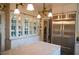 Open kitchen with stainless steel appliances and a large refrigerator at 219 Rigby St, Reevesville, SC 29471