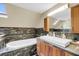 Elegant bathroom featuring a soaking tub, granite countertops, and modern fixtures at 2224 Shoreline Dr, Johns Island, SC 29455