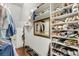 Walk-in closet with built-in shelves and hanging space, providing ample storage at 2224 Shoreline Dr, Johns Island, SC 29455