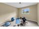 Carpeted exercise room featuring natural light and ample space for workout equipment at 2224 Shoreline Dr, Johns Island, SC 29455