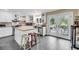 Spacious kitchen featuring stainless steel appliances, white cabinets, and outdoor access at 2224 Shoreline Dr, Johns Island, SC 29455