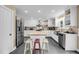 Bright, spacious kitchen featuring white cabinets, a butcher block island, and stainless steel appliances at 2224 Shoreline Dr, Johns Island, SC 29455