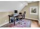 A home office space with a traditional desk, chair, and bright window view at 2224 Shoreline Dr, Johns Island, SC 29455