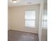 Bedroom featuring neutral carpet, white walls, and a window with white blinds at 232 Buchanan Cir, Goose Creek, SC 29445