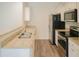 Modern kitchen featuring granite countertops, stainless steel appliances, and plenty of cabinet space at 232 Buchanan Cir, Goose Creek, SC 29445