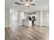 Spacious open-plan living area with a view of the kitchen and front entry at 232 Buchanan Cir, Goose Creek, SC 29445